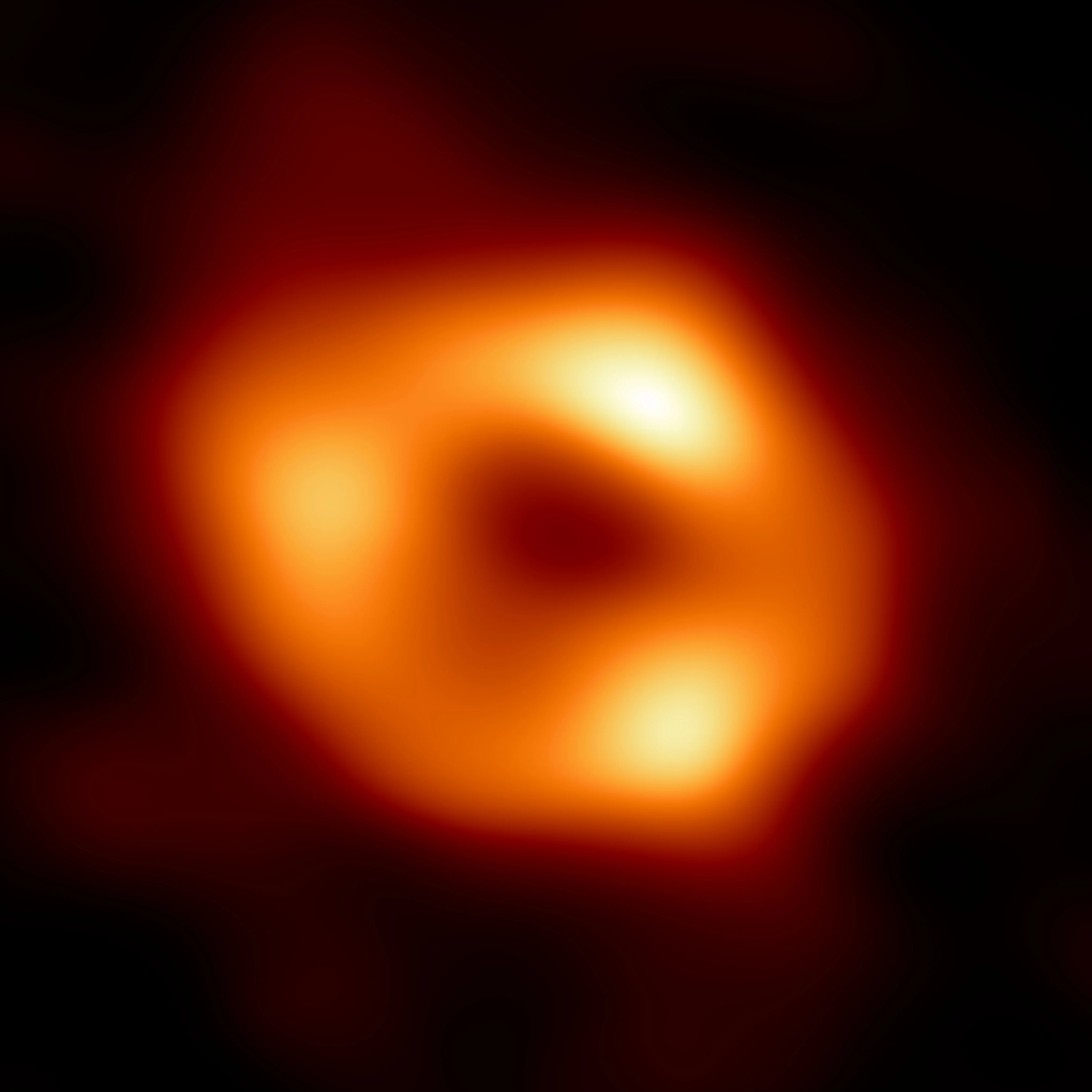 Erstes direktes Bild von Sagittarius A*, dem supermassereichen Schwarzen Loch im Zentrum der Milchstraße, veröffentlicht 2022 vom Event Horizon Telescope.